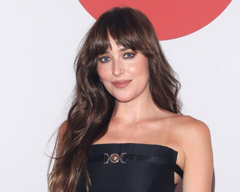 Dakota Johnson Goes Classic in Black Dress for Martini 160th Celebration in Italy