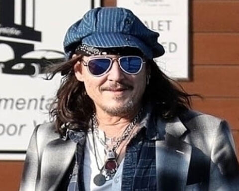 Johnny Depp Is All Smiles While Walking With a Cane After Ankle Injury