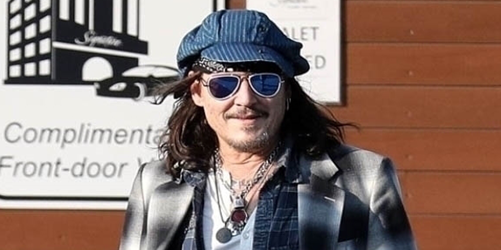 Johnny Depp Is All Smiles While Walking With a Cane After Ankle Injury