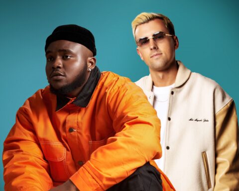Promotional image for "Boundaries" which is a photoshopped image which sees Phaemous in a bright orange jacket and a black beanie hat overlaying DJames, who is wearing an off-white jacket over a white t-shirt, paired with dark shades that contrasts with his short blonde hair.