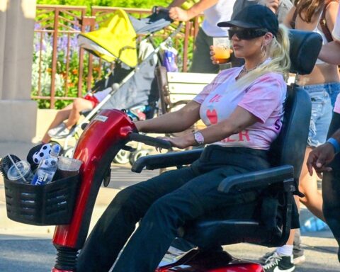 Christina Aguilera Rides Electric Wheelchair Around Disneyland Park