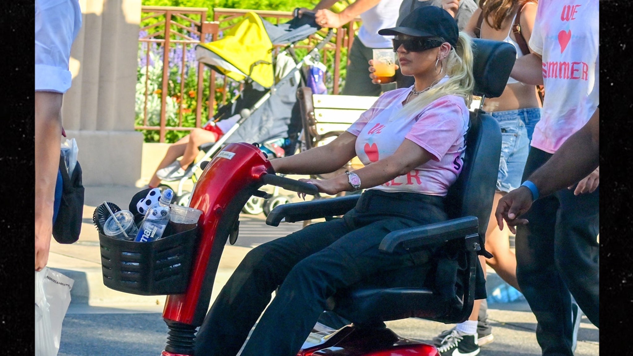 Christina Aguilera Rides Electric Wheelchair Around Disneyland Park