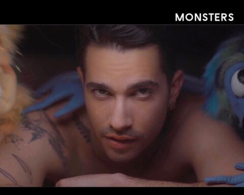 Single cover artwork for "Monsters" which sees Sam J Garfield under the bed with the yellow puppet monster to his right and the purple-blue puppet monster to his left.