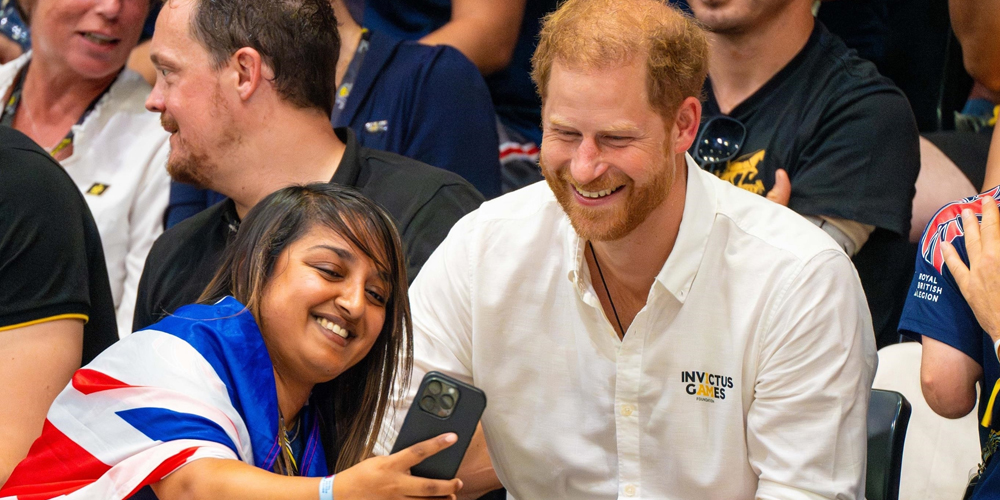 Prince Harry Says He & Meghan Markle Are A 'Competitive' Family During Invictus Games Day #2