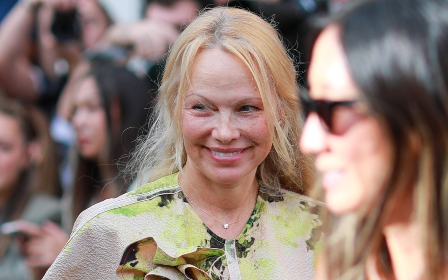 Pamela Anderson Explains Decision to Go Makeup-Free at Paris Fashion Week